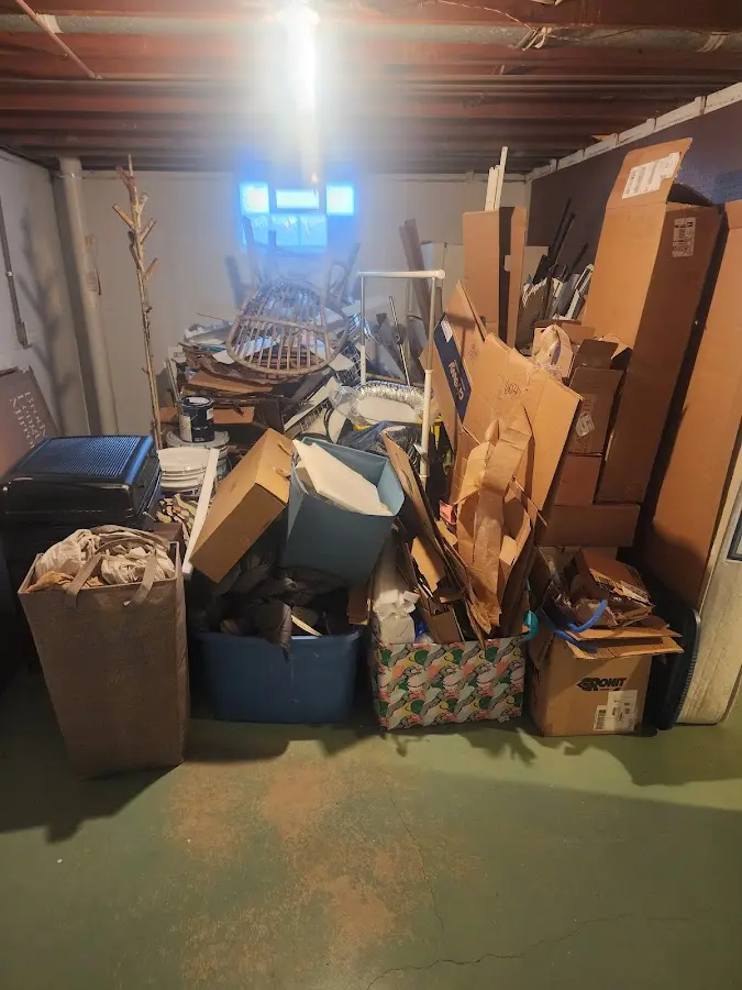 Roll-off dumpster container at job site for 6 Yard Dumpster Rental in Four Square Mile